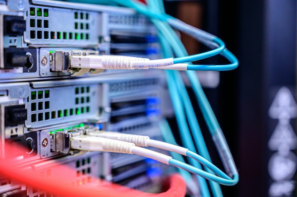 pexels-photo-2881233-2881233 Detailed shot of Ethernet cables connected to server ports highlighting technology infrastructure.